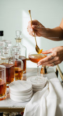 Elegant Orange Cocktail in Stylish Glass with Citrus Garnish