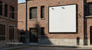 Empty billboard on vintage brick building exterior