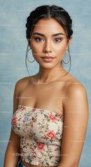 Portrait of a Young Woman Wearing Floral Crop Top with Confident Expression