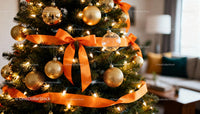 Christmas Tree Decorated with Golden Ornaments and Orange Ribbon