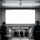 Commuters walking through subway station entrance