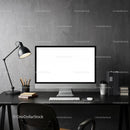 Minimalist workspace with computer and desk lamp