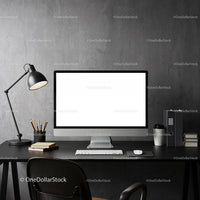 Minimalist workspace with computer and desk lamp