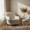 Cozy beige armchair with modern side tables in natural light