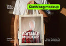 Man holding cloth bag Editable PSD Mockup preview