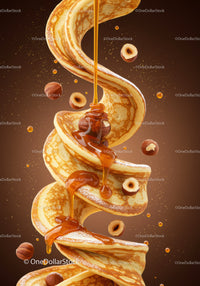 Swirling Pancakes Drizzled with Honey and Floating Hazelnuts