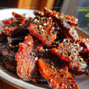 Juicy Grilled Pork Ribs with Barbecue Sauce and Crispy Edges