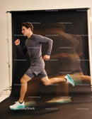 Athletic young man sprinting in dynamic motion blur effect