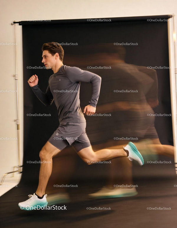 Athletic young man sprinting in dynamic motion blur effect