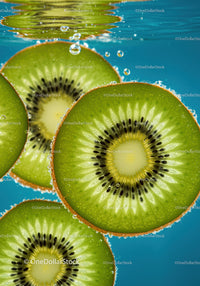Fresh kiwi slices submerged in clear blue water