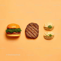 Gourmet Burger with Lettuce and Tomato Next to Grilled Steak and Dumpling