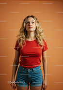 Thoughtful young woman looking upward in casual outfit