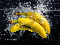 Fresh Yellow Bananas Splashing into Water with Fruit-Vibrant Impact