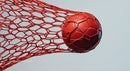 Red Soccer Ball in Goal Net with Dynamic Sports Atmosphere