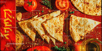 Freshly Baked Cheese Pizza Slices on Red Table with Tomatoes and Herbs