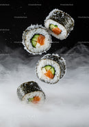 Fresh salmon sushi rolls with cucumber on smoky background