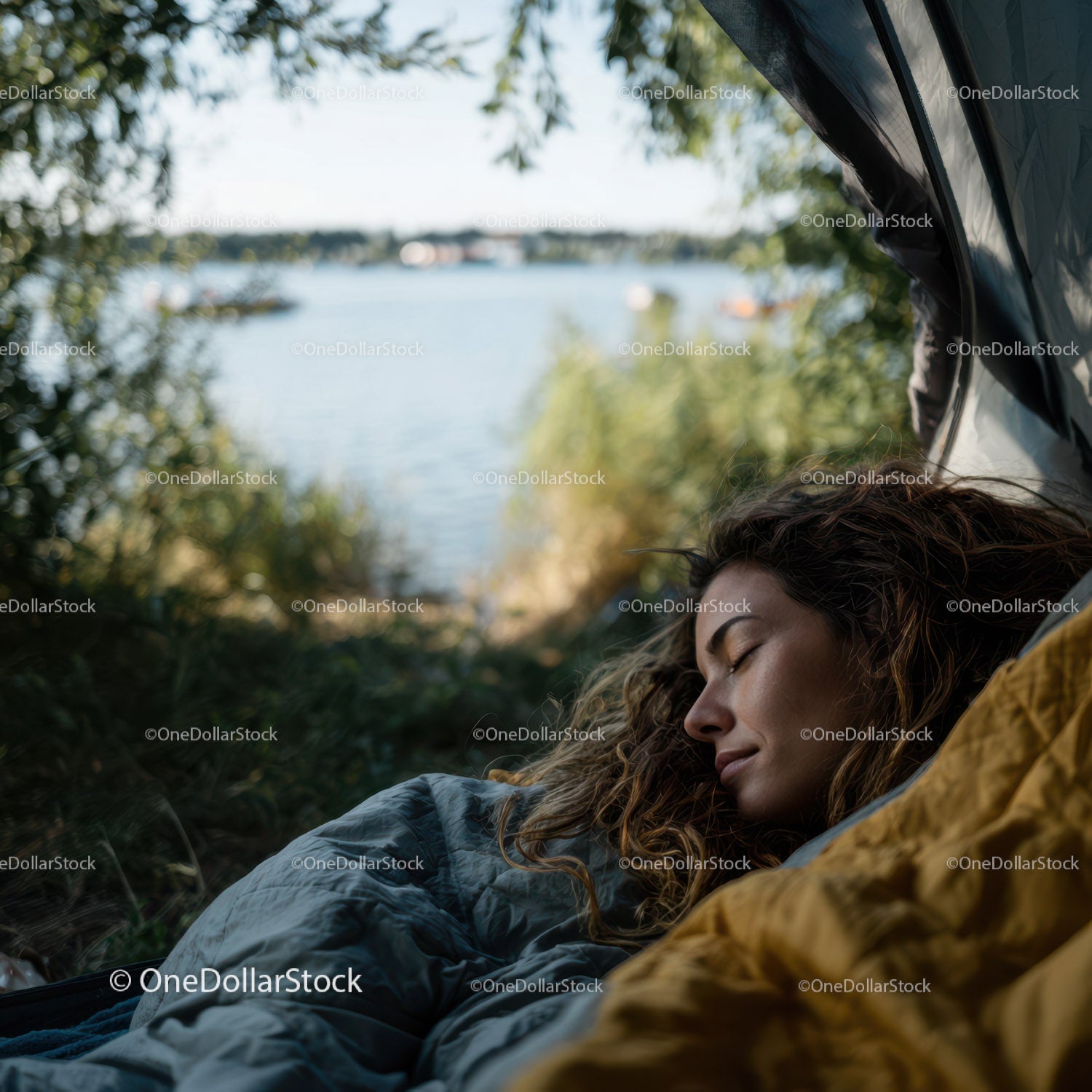 Relaxing Woman Sleeping by Lake in Nature During Camping Trip