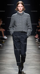 Fashion Model Walking Down Runway in Gray Turtleneck and Tailored Trousers