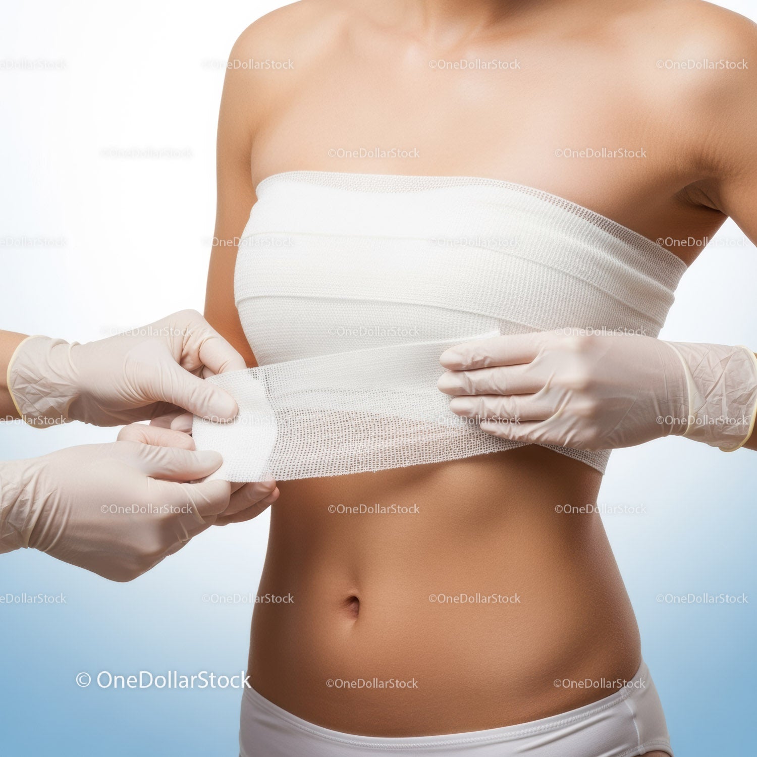 Woman Applying Medical Bandage to Abdomen for Skin Protection
