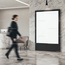 Modern office lobby with blank billboard and moving person