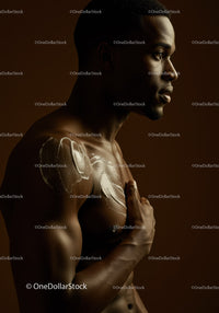 Close-up of a Man Applying Body Lotion for Skincare Routine
