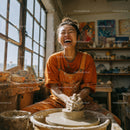 Joyful Woman Creating Handmade Pottery in Artistic Studio