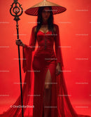 Elegant Woman in Red Dress with Accessories Against Red Background