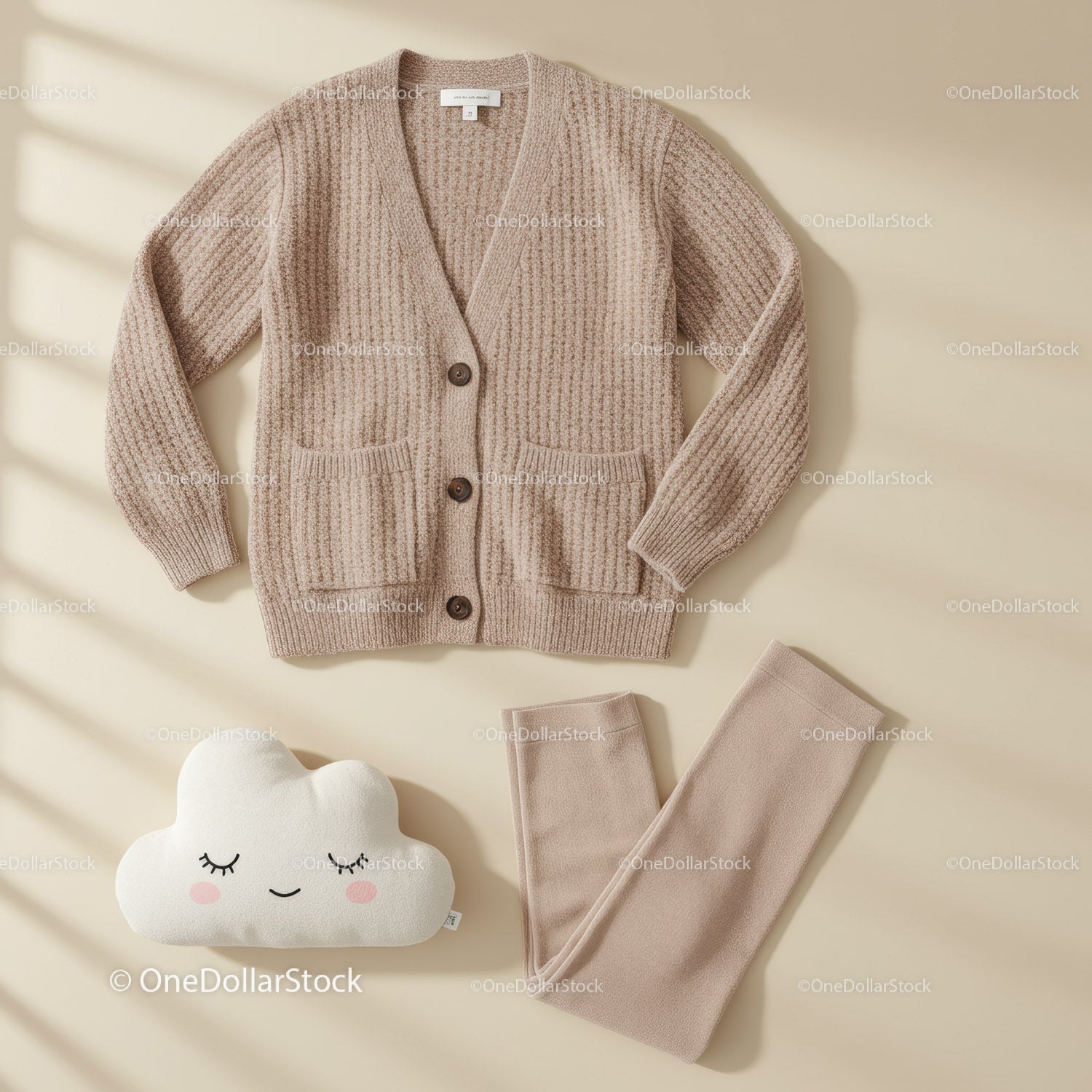 Cozy beige knitted cardigan with soft cloud pillow