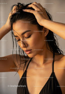 Elegant Woman with Black Hair and Smooth Skin in Fashion Portrait