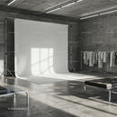 Minimalist Fashion Studio with White Backdrop and Clothing