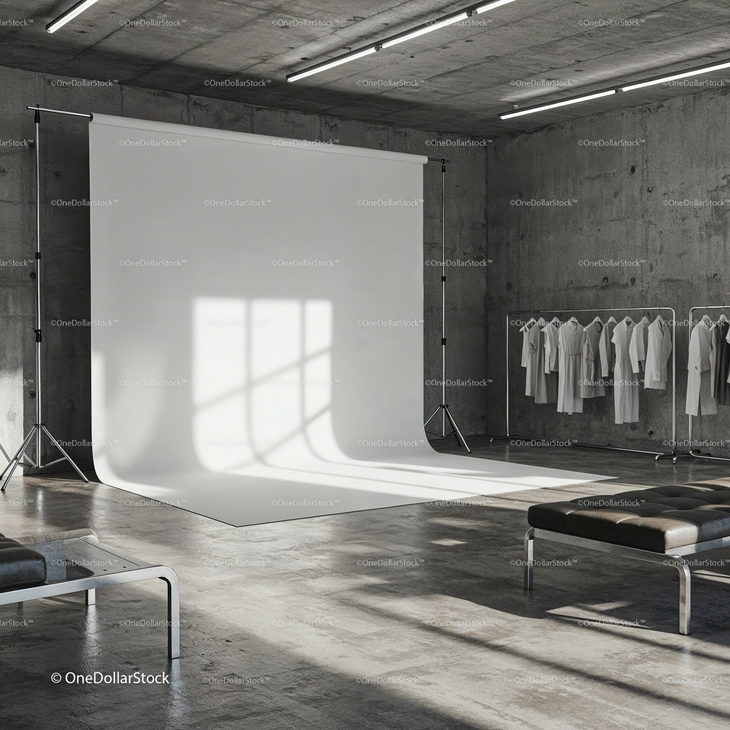 Minimalist Fashion Studio with White Backdrop and Clothing