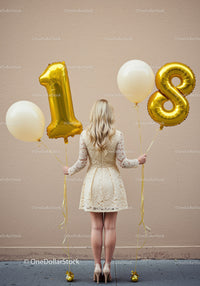 Blonde woman celebrating eighteenth birthday with balloons