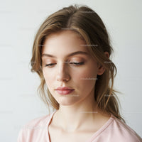 Elegant Woman with Natural Makeup and Soft Expression for Beauty Portrait