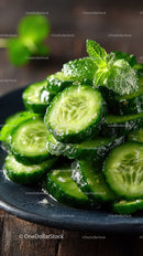 Fresh Cucumber Slices on Black Plate with Mint Garnish