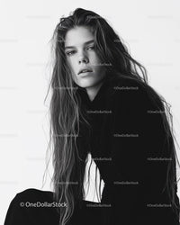 Fashionable Black and White Portrait of a Young Woman with Long Hair