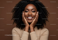 Joyful Woman with Curly Afro Hair in Studio Portrait