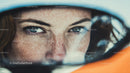 Close-Up of a Woman’s Face with Sunglasses and Bright Blue Eyes