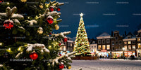 Snowy Christmas tree with glowing lights in town square
