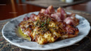 Cheesy Ham Pizza with Melted Cheese and Fresh Herbs
