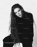 Black and White Portrait of Young Woman with Wet Hair and Intense Gaze