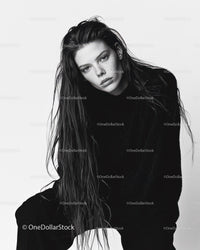 Black and White Portrait of Young Woman with Wet Hair and Intense Gaze