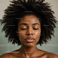 Young Woman with Curly Hair Reclining During Facial Skincare Scene