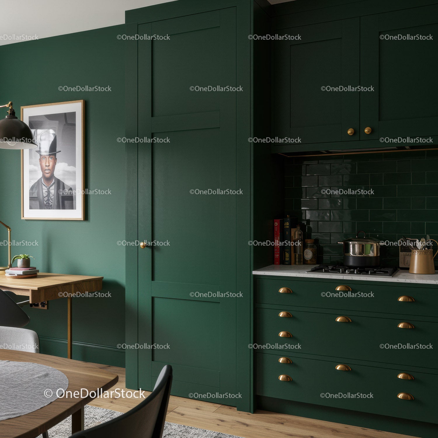 Dark Green Kitchen Cabinets with Brass Hardware and Black Backsplash