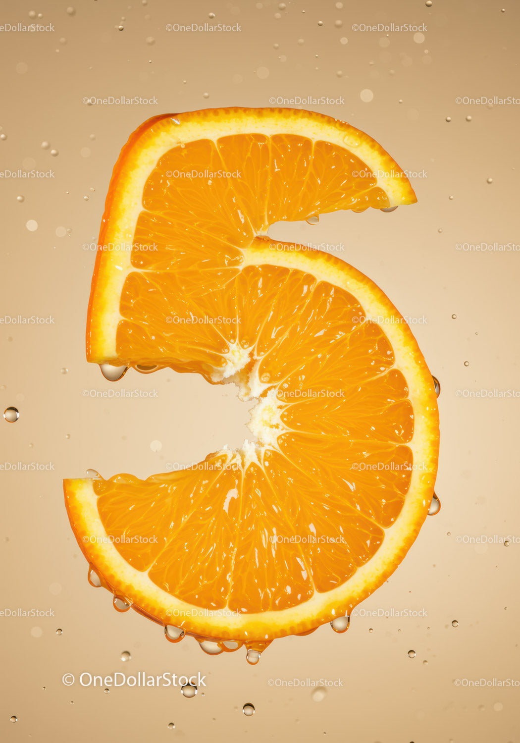 Fresh orange slice shaped like number five underwater