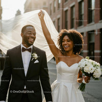 Joyful Newlyweds Celebrating in Urban Setting