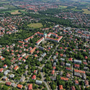 Aerial View of Green Residential Neighborhood with Colorful Rooftops
