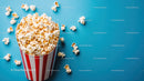 Bucket of Popcorn in Gift Bag on Bright Blue Background