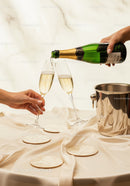 Champagne Toast in Elegant Setting with Sparkling Wine and Clinking Glasses