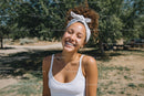 Joyful Woman Smiling Outdoors in Summer Park