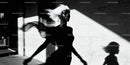 Elegant woman with flowing hair in dynamic silhouette